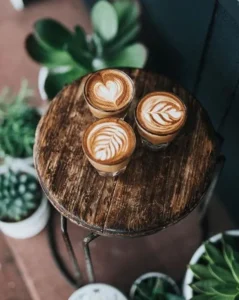 Fresh coffee with latte art at the Best Bakery in Wayanad